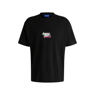 HUGO BOSS OVERSIZE-FIT T-SHIRT IN COTTON WITH HAPPY HUGO LOGO