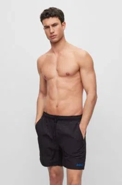 HUGO BOSS SWIM SHORTS IN QUICK-DRYING FABRIC WITH EMBROIDERED LOGO