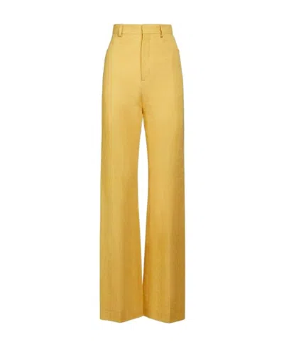 JACQUEMUS HIGH-WAISTED FLARED TROUSERS