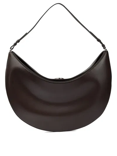 JACQUEMUS LE OVALO SHOULDER BAGS BROWN