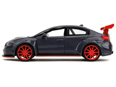 JADA 2016 SUBARU WRX STI WIDEBODY DARK BLUE AND YUJI ITADORI DIECAST FIGURE "JUJUTSU KAISEN" (2020Â€"2023