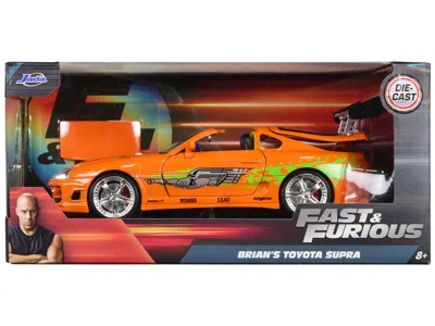 JADA BRIAN'S TOYOTA SUPRA ORANGE WITH GRAPHICS "FAST & FURIOUS" MOVIE 1/24 DIECAST MODEL CAR BY JADA