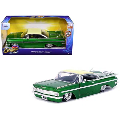 JADA TOYS JADA 1959 CHEVROLET IMPALA LOWRIDER GREEN METALLIC WITH CREAM TOP & WIRE WHEELS STREET LOW SERIES 1-