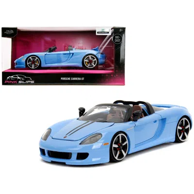 JADA TOYS JADA PORSCHE CARRERA GT CONVERTIBLE WITH STRIPES PINK SLIPS SERIES 1-24 SCALE DIECAST MODEL CAR BLUE