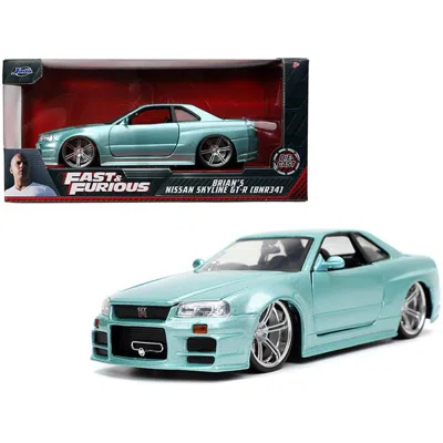 JADA TOYS JADA RIGHT HAND DRIVE TURQUOISE METALLIC FAST & FURIOUS MOVIE 1 BY 24 DIECAST MODEL CAR FOR BRIANS N