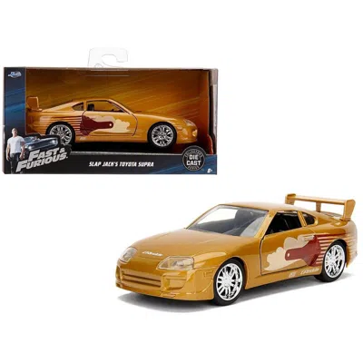 JADA TOYS JADA SLAP JACKS TOYOTA SUPRA GOLD FAST & FURIOUS MOVIE 1-32 DIECAST MODEL CAR