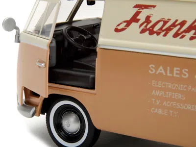 JADA VOLKSWAGEN BUS "WHEELJACK" TAN AND BEIGE "FRANK'S TV REPAIR" AND TRANSFORMERS LOGO DIECAST STATUE "T