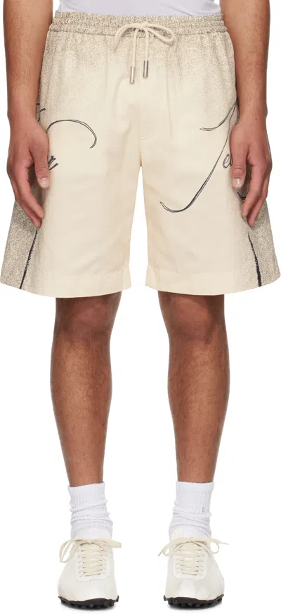 JEAN PAUL GAULTIER BEIGE 'THE MULTI-TATTOO' SHORTS