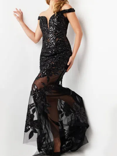 JOVANI TULLE OFF SHOULDER SHEER GOWN IN BLACK