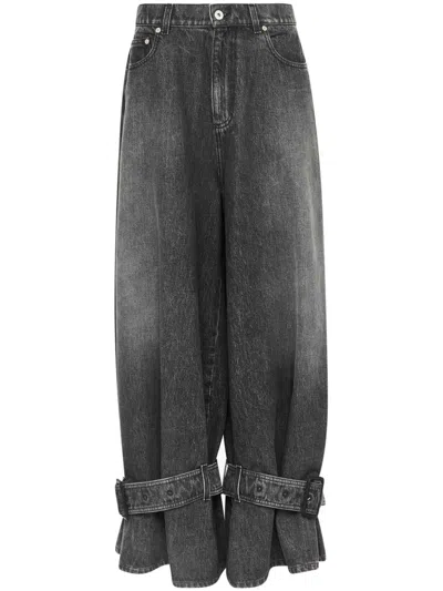 JW ANDERSON BUCKLED-CUFF JEANS