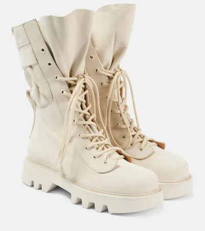 JW ANDERSON LEATHER COMBAT BOOTS