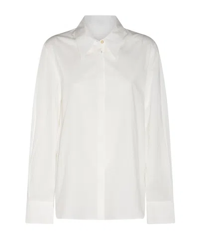 KHAITE KHAITE MINTA CURVED HEM SHIRT