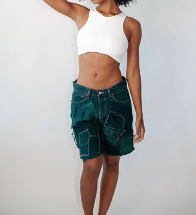 KNOTWTR PATCHED DENIM SHORTS IN GREEN