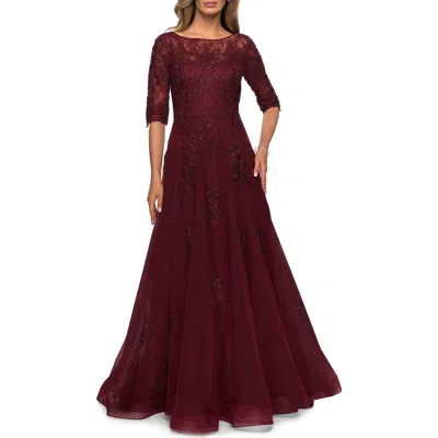 LA FEMME LA FEMME LACE AND TULLE A-LINE GOWN WITH THREE QUARTER SLEEVES