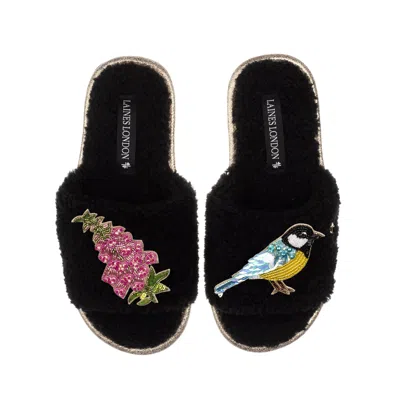 LAINES LONDON WOMEN'S TEDDY TOWELING SLIPPER SLIDERS WITH PINK FOXGLOVE FLOWERS & BLUE TIT BROOCHES - BLACK
