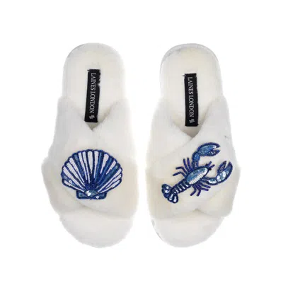 LAINES LONDON WOMEN'S WHITE CLASSIC LAINES SLIPPERS WITH MEDITERRANEAN BLUE SHELL & LOBSTER BROOCHES - CREAM
