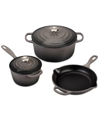 LE CREUSET FIVE PIECE ENAMELED CAST IRON COOKWARE SET