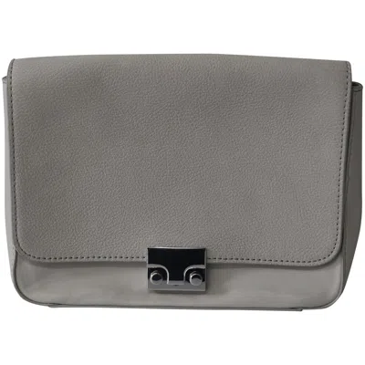 LOEFFLER RANDALL LOCK FLAP HANDBAG WITH METAL CHAIN IN GREY LEATHER