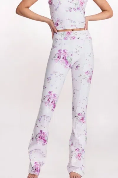 LOVESHACKFANCY REED FLORAL FLARE LEGGINGS IN MAGENTA GLOW
