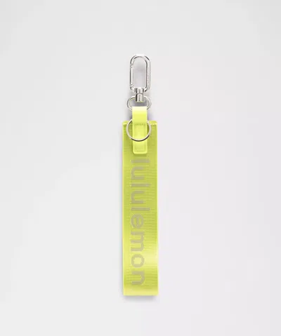 LULULEMON LULULEMON - NEVER LOST KEYCHAIN - SOUR GRAPE/ARMY GREEN