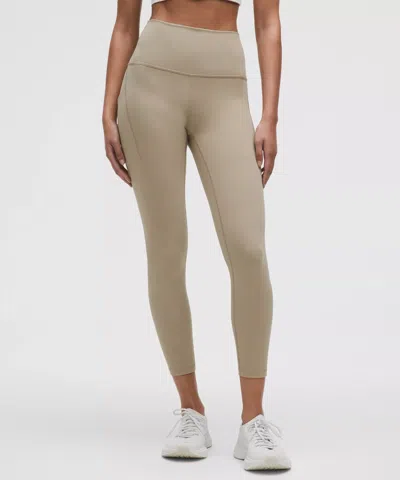 LULULEMON WUNDER TRAIN HIGH-RISE TIGHT WITH POCKETS 25"