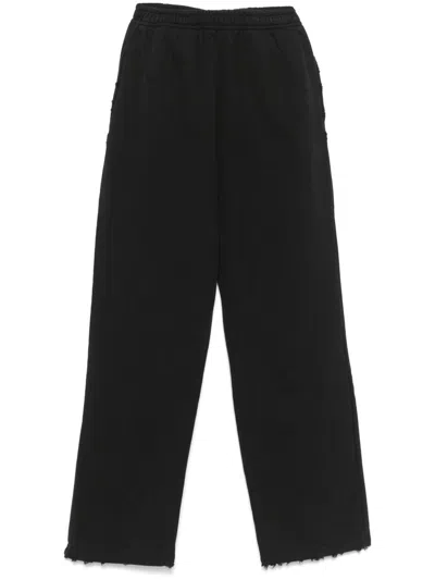 MAINLESS DISTRESSED TRACK TROUSERS