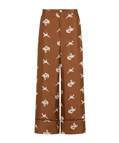 MARNI BROWN SILK TWILL TROUSERS WITH RAVEN PRINT