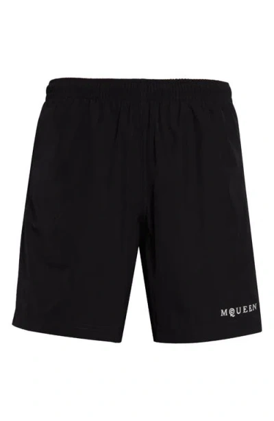 ALEXANDER MCQUEEN MCQUEEN EMBROIDERED LOGO SWIM TRUNKS