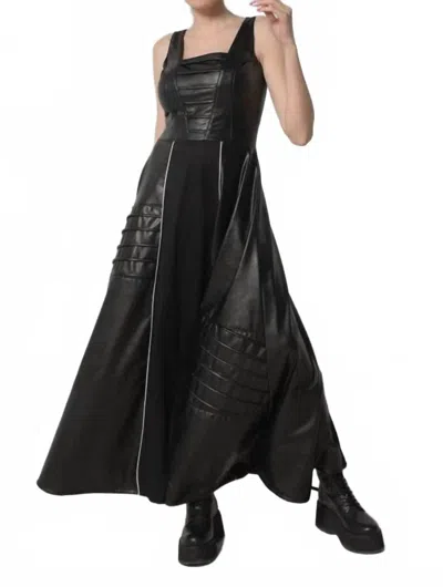 METAMORFOSI LONG FLARE VEGAN LEATHER DRESS IN BLACK