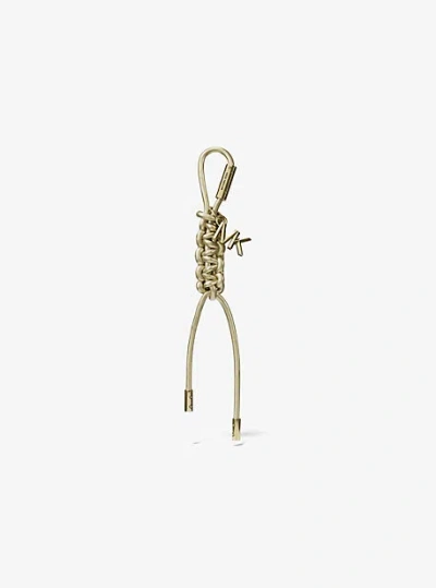 MICHAEL KORS GOLD-TONE AND METALLIC BRAIDED CORD BAG CHARM