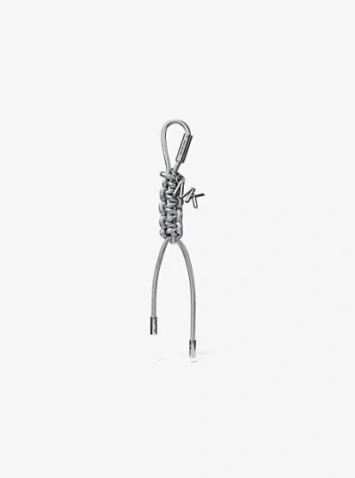 MICHAEL KORS SILVER-TONE AND METALLIC BRAIDED CORD BAG CHARM