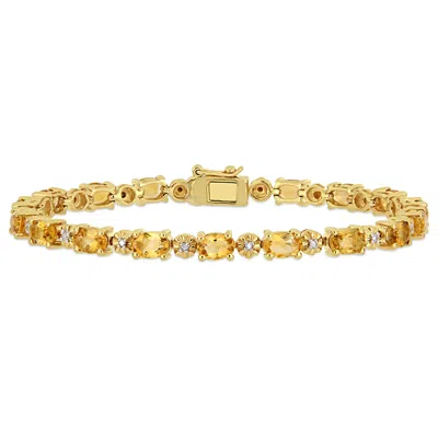 MIMI & MAX 8 1/10CT TGW OVAL-CUT CITRINE AND DIAMOND ACCENT TENNIS BRACELET IN YELLOW SILVER