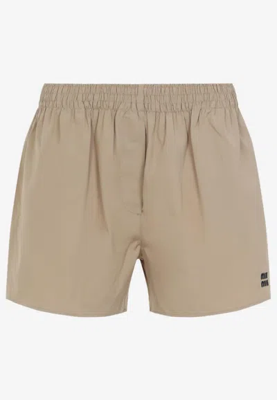 MIU MIU LOGO TRACK SHORTS