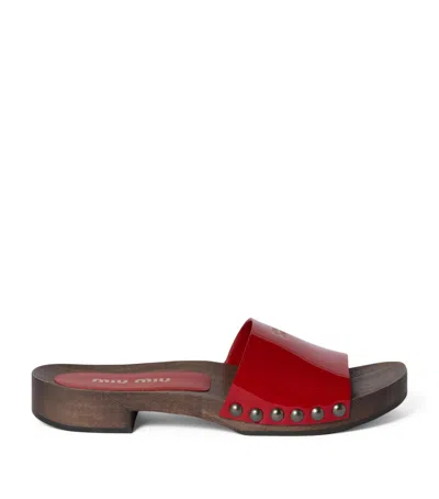 MIU MIU PATENT LEATHER CLOGS