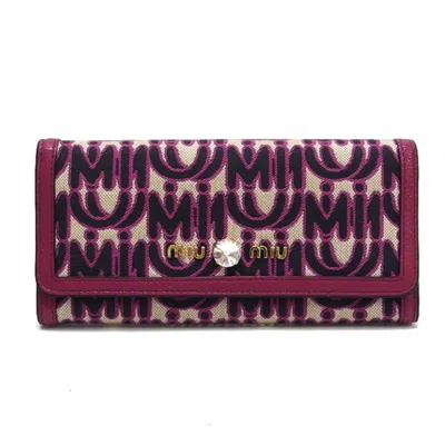 MIU MIU PINK PINK CANVAS LONG WALLET (BI-FOLD) (PRE-OWNED)