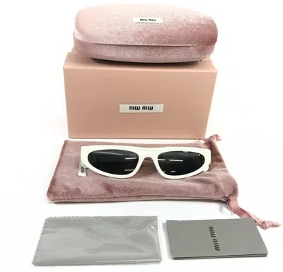 MIU MIU MIU MIU SUNGLASSES SMU07Z 142-5S0 WHITE IVORY GOLD FRAMES WITH DARK GREY LENSES