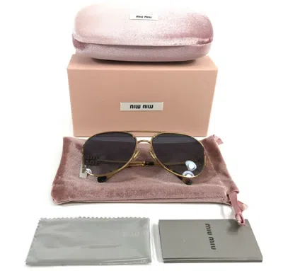 MIU MIU MIU MIU SUNGLASSES SMU52Z 7OE-5D1 GOLD AVIATOR FRAMES WITH GRAY GRADIENT LENSES