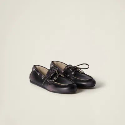 MIU MIU UNLINED BLEACHED LEATHER BOAT SHOES