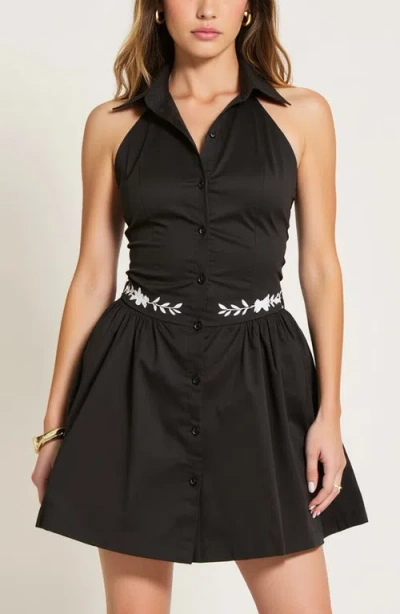 MODENAIRE MODENAIRE EMBROIDERED WAIST BUTTON-FRONT HALTER MINI DRESS WITH SMOCKED OPEN BACK