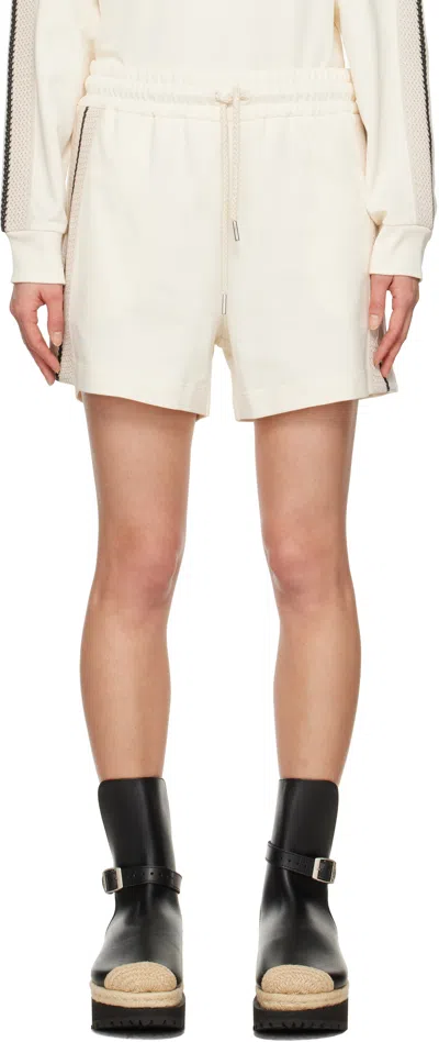 MONCLER OFF-WHITE STRIPED TRIM SHORTS
