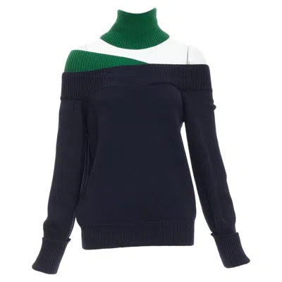 MONSE MERINO WOOL ASYMMETRIC CUT OUT SWEATER