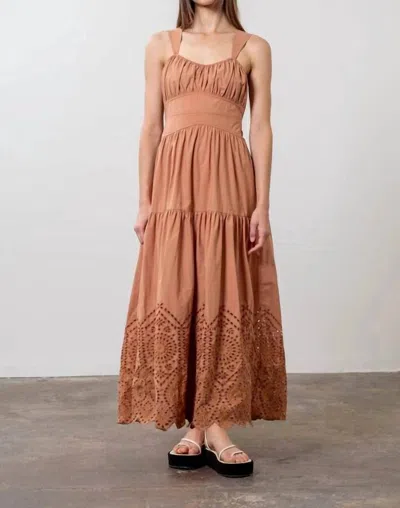 MOON RIVER TIERED EYELET BACK BOW DRESS IN TERRACOTTA