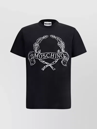 MOSCHINO GRAPHIC PRINT LOGOED T-SHIRT WITH STRIKING DETAIL