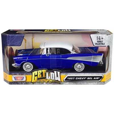 MOTORMAX 1957 CHEVROLET BEL AIR LOWRIDER CANDY BLUE WITH WHITE TOP GET LOW SERIES 1-24 SCALE DIECAST MODEL CA