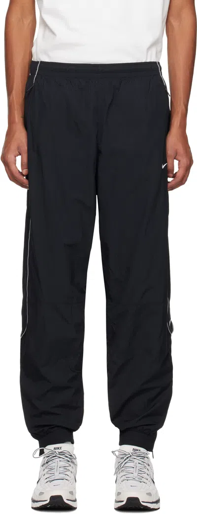 NIKE BLACK SOLO SWOOSH TRACK PANTS