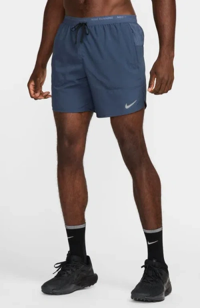 NIKE NIKE DRI-FIT STRIDE 7-INCH BRIEF-LINED RUNNING SHORTS
