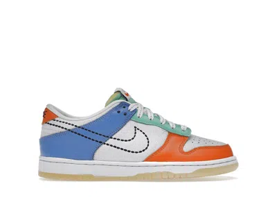 NIKE DUNK LOW NIKE 101 SNEAKERS IN WHITE/BLACK/SAFETY ORANGE