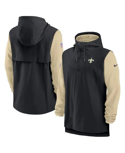 NIKE MEN'S BLACK/GOLD NEW ORLEANS SAINTS SIDELINE PLAYER QUARTER-ZIP HOODIE