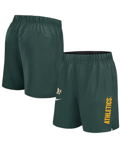 NIKE MEN'S GREEN ATHLETICS WOVEN VICTORY PERFORMANCE SHORTS