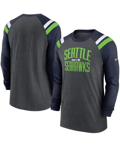 NIKE MEN'S NIKE HEATHERED CHARCOAL, COLLEGE NAVY SEATTLE SEAHAWKS TRI-BLEND RAGLAN ATHLETIC LONG SLEEVE F